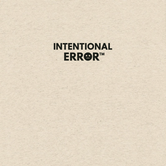 Back of shirt featuring small “Intentional Error” logo centered across the shoulders, minimalist design.