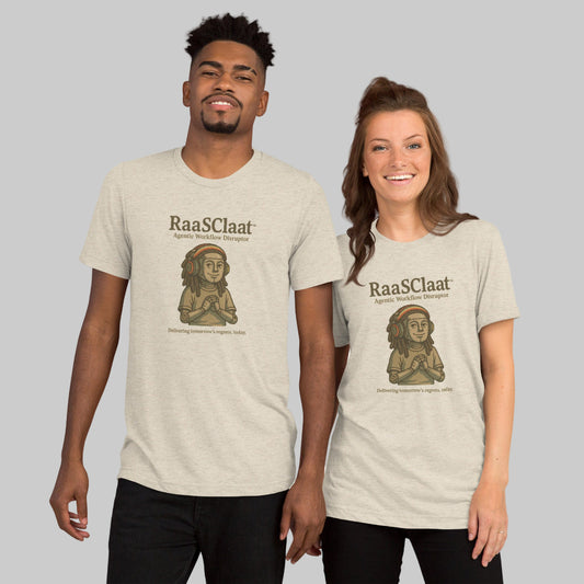 Two people wearing 'RaasClaat' t-shirts with a graphic design on a white background