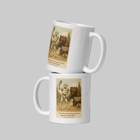 Two white mugs with vintage-style illustrations of a robot and bear on a white background