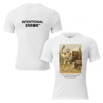 T-shirt featuring a robot taking a selfie in front of a roaring bear at Yellowstone National Park. Satirical AI influencer design.