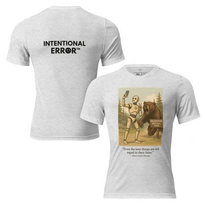T-shirt featuring a robot taking a selfie in front of a roaring bear at Yellowstone National Park. Satirical AI influencer design.